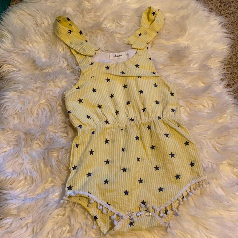 Star pom romper with tie straps